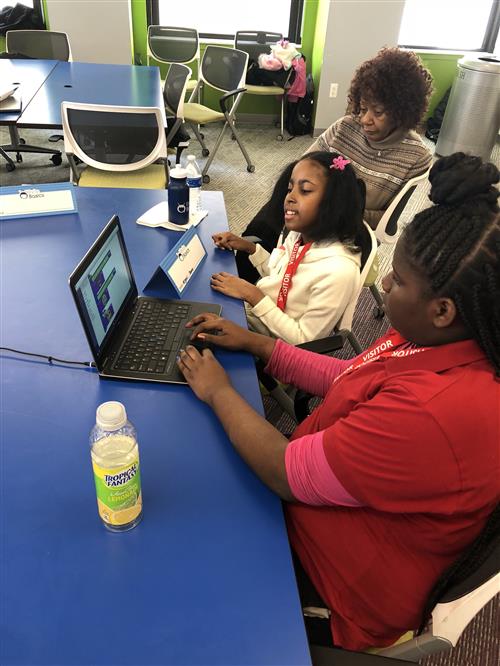 students working on computer 
